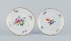 Royal 
Copenhagen, 
Saxon Flower, a 
plate and a low 
bowl 
hand-decorated 
with polychrome 
flowers ...
