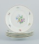 Bing & 
Grøndahl, Saxon 
Flower, a set 
of five dinner 
plates 
hand-decorated 
with polychrome 
...