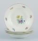 Bing & 
Grøndahl, Saxon 
Flower, a set 
of four deep 
plates 
hand-decorated 
with polychrome 
flowers ...