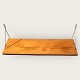 Wall-hung shelf in teak veneer. With traces of use. Dimensions: 80x 25 cm