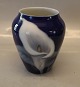 B&G 92-198 Deep 
blue vase with 
white flower 12 
cm
 Bing and 
Grondahl Marked 
with the three 
...