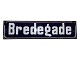 Dark blue enamel sign "Bredegade". Curved shape.Measures 48.0 by 12.0 cm.There are a ...