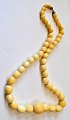 Ivory necklace- consisting of round balls in varied sizes, 19/20. C. L: 60 cm.Perfect condition!