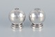 Harald Nielsen 
for Georg 
Jensen. A pair 
of Pyramid salt 
and pepper 
shakers in 
sterling ...