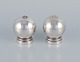 Harald Nielsen 
for Georg 
Jensen. A pair 
of Pyramid salt 
and pepper 
shakers in 
sterling ...