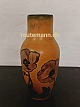 Ceramic vase from Peter Ipsen's Enke. Painted with poppies. Signed by the artist. Appears in ...