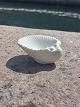 Seashell salt 
bowl in 
porcelain from 
Royal 
Copenhagen. 
Glazed inside 
without glaze 
outside. In ...