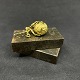 Length 6 cm.Unusual brooch from the 1860s-1870s in gilt brass and with room for two ...