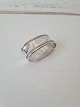 Napkin ring in 
silver by Svend 
Toxværd 
Stamped SVT - 
830
Dimension 3 x 
5 cm. Width 2 
cm.