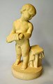 Danish artist (20th century): A boy with an accordion. Artificial stone. Signed: Monogram. ...