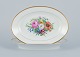 Bing & 
Grondahl, two 
oval platters 
hand-painted 
with polychrome 
flower motifs 
and gold ...