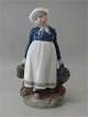 Royal 
Copenhagen 
Peasant girl 
with lunch Chr. 
Thomsen 1907 22 
cm 1st In mint 
and nice 
condition