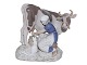 Large Bing & Grondahl figurine, farmgirl with calf and white cat.The factory mark tells, ...