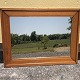 Older mirror in a wooden frame, some traces of use. Dimensions: 74x57 cm