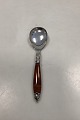Danish Ormental 
Serving Spoon 
with handle of 
Imitation Amber 

Measures 16cm 
/ 6.30 inch