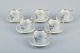 Bing & 
Grøndahl, a set 
of six antique 
coffee cups 
with high 
handles and  
saucers. 
Hand-painted 
...