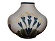 Aluminia vase 
with yellow 
flowers.
&#8232;This 
product is only 
at our storage. 
It can be ...