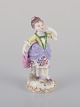 Antique German porcelain figurine. Young woman in elegant attire. Hand-painted in polychrome ...