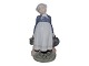 Royal 
Copenhagen 
Figurine, 
farmgirl with 
milk churn and 
lunch box.
The factory 
mark tell that 
...