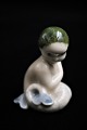Royal 
Copenhagen 
porcelain 
figurine of a 
little mermaid. 

Height: 5cm. 
Decoration 
number: 2313. 
...