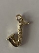 Saxophone 
Pendant #14 
carat Gold
Stamped 585
Height 13,52 
mm
Width 7,45 mm
Nice and well 
...