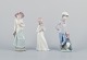Three Nao 
porcelain 
figurines. Boys 
and girls with 
pets.
Approximately 
from the ...