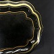 Length 43 cm.
Width 35 cm.
Charming older 
black painted 
iron tray with 
gold edges.
The tray ...