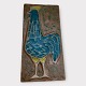 Bornholm 
ceramics, 
Søholm, Relief 
with a rooster, 
34cm high, 17cm 
wide, No. 3524, 
Design Maria 
...