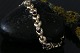 Beautiful and elegant gold bracelet, with inlaid stones 14 carat. The individual links are made ...