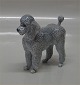 Royal 
Copenhagen dog 
4757 RC Poodle 
12 cm. 1. in 
nice and mint 
codition. 
Design Jeanne 
Grut
