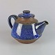 Tekande af 
keramik i blå 
og brune farver
Design Michael 
Andersen
Højde 18 cm 
Diameter 18 cm