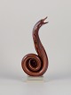 Murano, Italy. 
Large sculpture 
depicting a 
cobra snake 
crafted in art 
glass. The 
glass features 
...