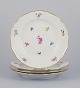 Meissen, 
Germany. A set 
of four dinner 
plates in 
porcelain, 
hand-painted 
with different 
...
