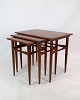 Side tables made of teak wood, produced by a Danish furniture architect around the 1960s, are ...