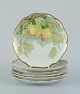 Rosenthal, 
Germany. A set 
of six 
porcelain 
plates with 
various fruit 
motifs. Gold 
...