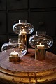 3 pieces. brass teapot candle holders from the 70s with glass top in different heights. Height: ...