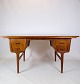 Desk / Dining table made of teak wood with a very unique design from Finland around the 1960s. ...