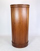 This oval-shaped rosewood pedestal cabinet, designed by Johannes Sorth for Bornholms Møbelfabrik ...
