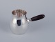 Georg Jensen 
creamer in 
sterling silver 
with an ebony 
handle.
Model 80A.
In excellent 
...
