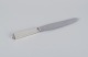 Georg Jensen 
Pyramide. Art 
Deco dinner 
knife with a 
long handle, 
stainless steel 
blade, and ...