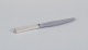 Georg Jensen 
Pyramide. Art 
Deco lunch 
knife with a 
long handle, 
stainless steel 
blade, and ...