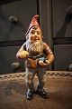 Old painted terracotta gnome with fine patina from around 1900. Height: 22cm.