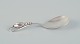 Georg Jensen, 
"Blossom" 
pattern sugar 
spoon in 
sterling 
silver.
Hallmarked 
with 1945-1951 
...