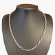 A necklace in 14k white gold.Clasp with two safety catches.L. 51 cm. W. 0,5 cm.Stamped ...