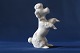 Beautiful small porcelain figurine of a king poodle. The figure is made with fine details and is ...
