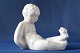 Nice little lying boy with frog, from Bornholm designed by Michael Andersen. Made of ceramic, ...