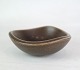 Ceramic bowl of brownish shades of quality craftsmanship with unknown arts from approx. ...
