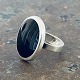 Ring with large black onyx stone made of sterling silver. Stamped 925 and GIF.A.Stone with ...