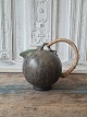 Arne Bang jug 
with bast 
handle. The jug 
has an 
incredibly 
beautiful green 
- gray - brown 
glaze. ...