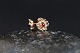 Beautifully 
detailed 
earrings in 14 
carat gold, 
designed as 
small flowers. 
The petals of 
the ...